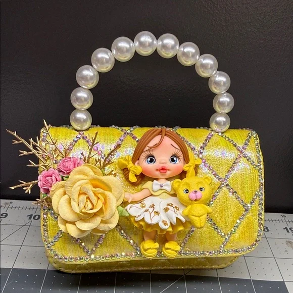 Yellow Pearl-Handle Kids Handbag with Doll and Flower Accent - Picture 4 of 4